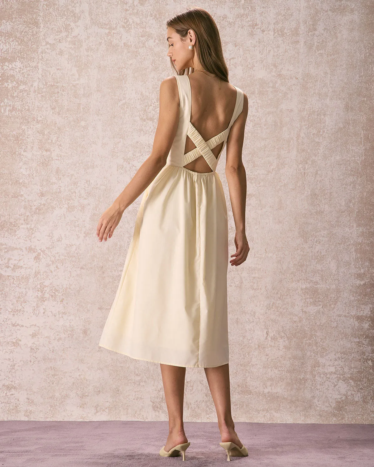 The Light Yellow Pleated Cross Back Midi Dress