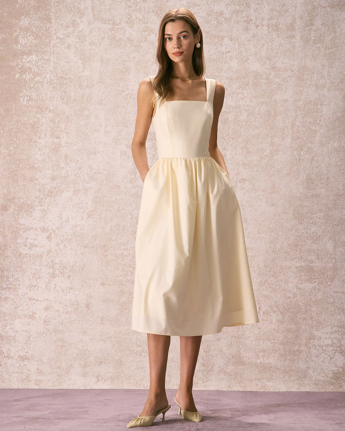 The Light Yellow Pleated Cross Back Midi Dress